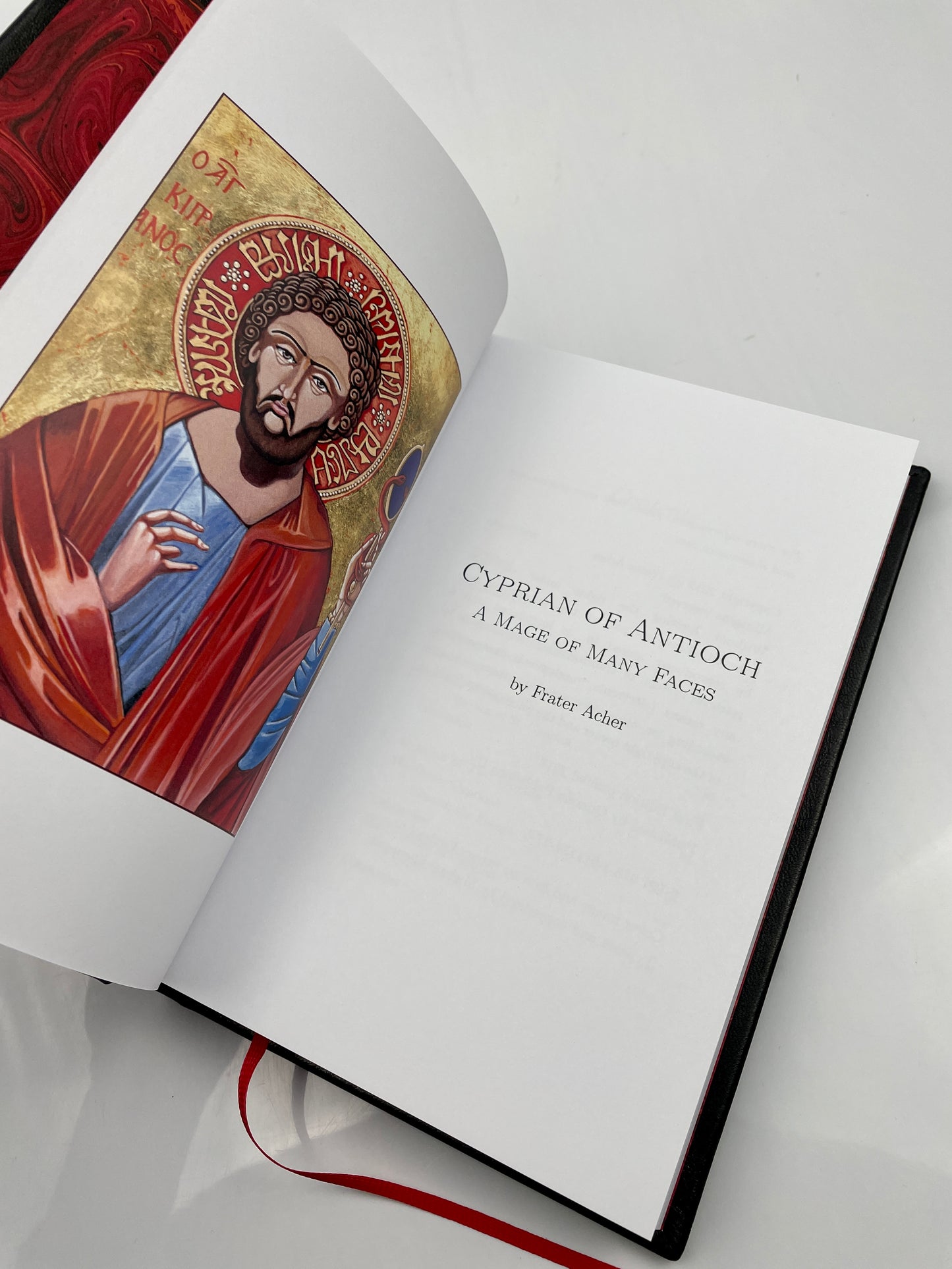 Title page of 'Cyprian of Antioch' featuring a large colored icon of Cyprian.
